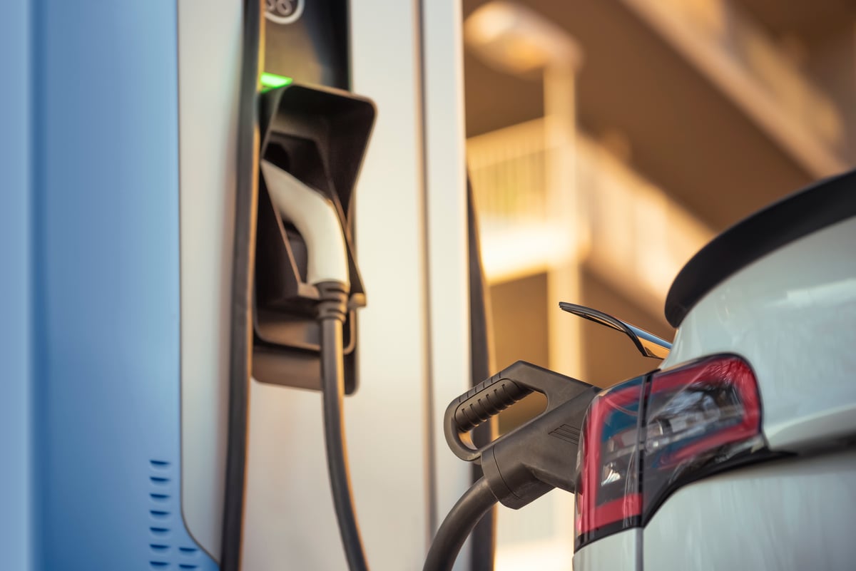 An electric vehicle being charged.